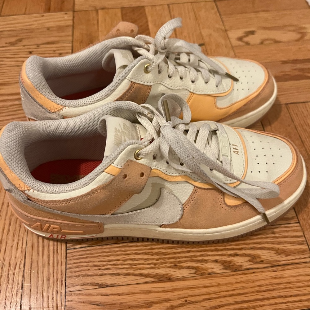 Nike Women's Sneakers in white and orange